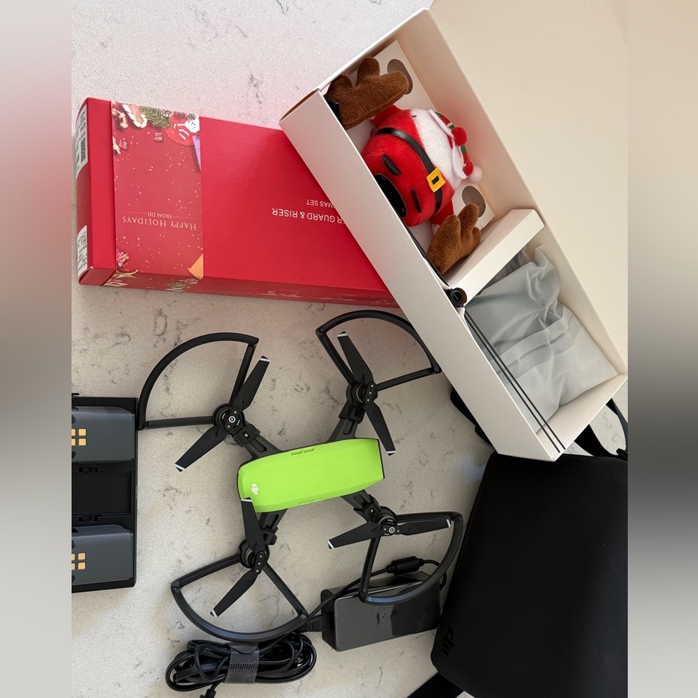 DJI Drone with Lime Green Top and Black Accessories